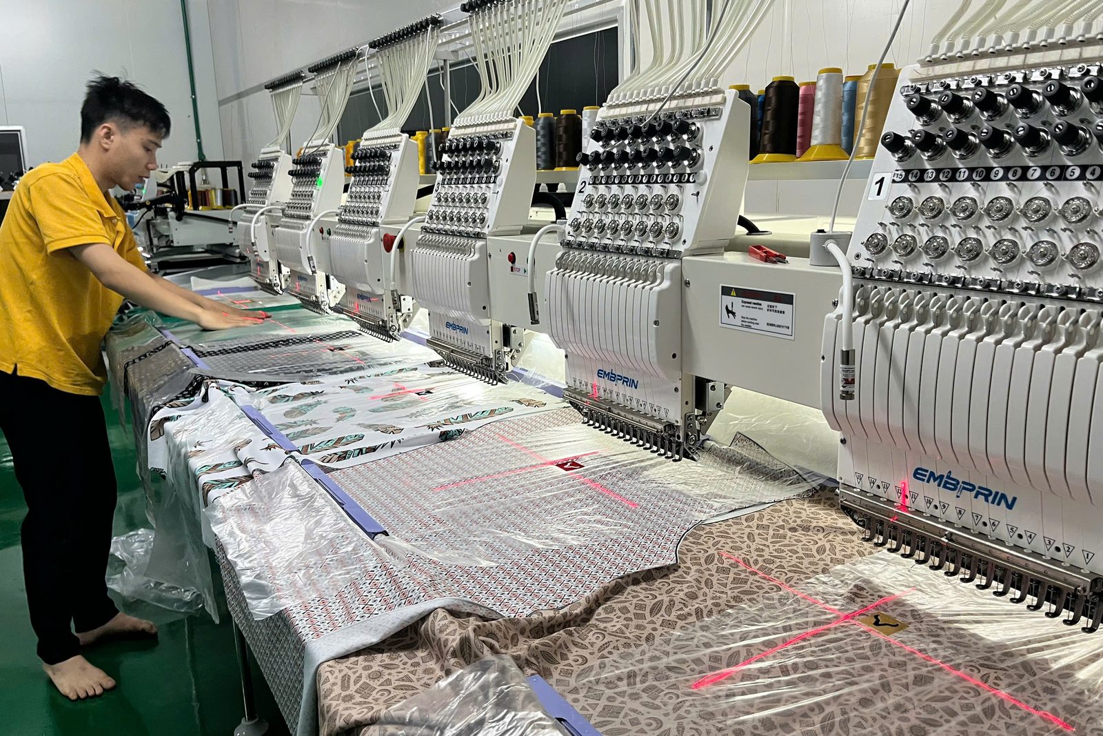 Custom Jersey Manufacturer 1 Custom jersey manufacturing facility with embroidery machines in Vietnam